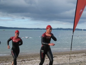Kirsty Whiting leads Debbie Tanner up the beach